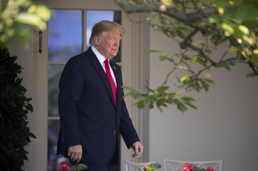President Donald Trump arrives before signing H.R. 1327, an act ensuring that a victims' compensation fund related to the Sept. 11 attacks never runs out of money, in the Rose Garden of the White House, Monday, July 29, 2019, in Washington. (AP Photo/J. Scott Applewhite)
