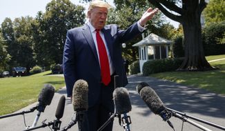 President Donald Trump speaks to media as he arrives at the White House in Washington, Tuesday, July 30, 2019, as the returns from Virginia. (AP Photo/Carolyn Kaster)