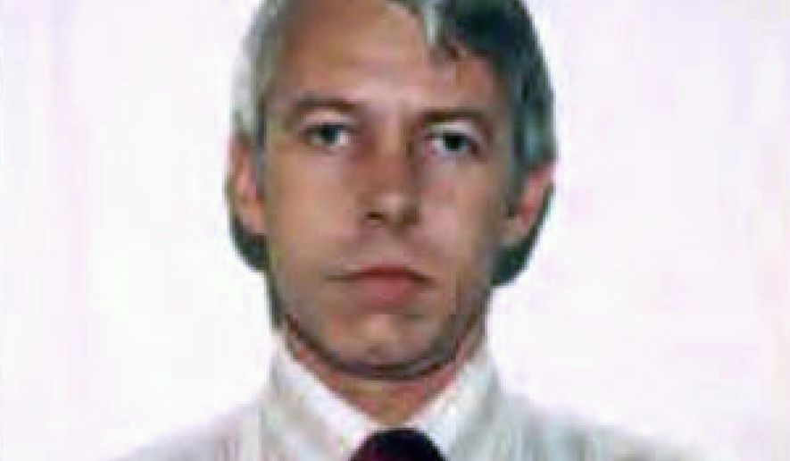 FILE – This undated file photo shows a photo of Dr. Richard Strauss, an Ohio State University team doctor employed by the school from 1978 until his 1998 retirement. Men who say they were sexually abused by Strauss are sharing how it changed their lives to make the case that the university owes them compensation. (Ohio State University via AP, File)