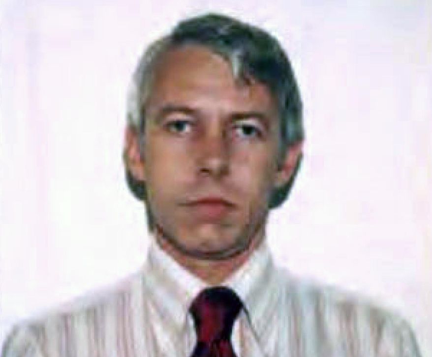 FILE – This undated file photo shows a photo of Dr. Richard Strauss, an Ohio State University team doctor employed by the school from 1978 until his 1998 retirement. Men who say they were sexually abused by Strauss are sharing how it changed their lives to make the case that the university owes them compensation. (Ohio State University via AP, File)