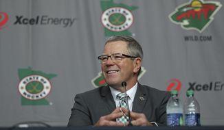 FILE - In this May 22, 2018 file photo Minnesota Wild NHL hockey team general manager Paul Fenton smiles during an introductory news conference in St. Paul, Minn. The Wild have fired Fenton after just one rough season, marked by the end of a six-year streak of making the playoffs and a disassembly of the once-promising core of forwards by trading Charlie Coyle, Mikael Granlund and Nino Niederreiter prior to the deadline. Wild owner Craig Leipold said he told Fenton of his dismissal on Tuesday, July 30, 2019 shortly before the team made the surprising late-summer announcement. (Shari L. Gross/Star Tribune via AP, file)