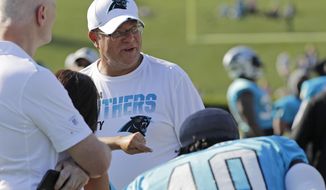 Carolina Panthers owner David Tepper watches his team during practice at the NFL football team&#39;s training camp in Spartanburg, N.C., Thursday, July 25, 2019. (AP Photo/Chuck Burton)