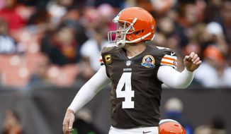  In this Dec. 9, 2012 file photo Cleveland Browns kicker Phil Dawson (4) kicks a field goal against the Kansas City Chiefs during an NFL football game in Cleveland. Dawson has retired from the NFL after 20 seasons. (AP Photo/Rick Osentoski, file) **FILE**