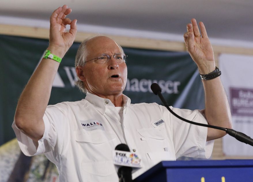 Former Chief Justice of the Mississippi Supreme Court Bill Waller Jr., a Republican candidate for governor, addresses the crowd at the Neshoba County Fair in Philadelphia, Miss., Thursday, Aug. 1, 2019. (AP Photo/Rogelio V. Solis)