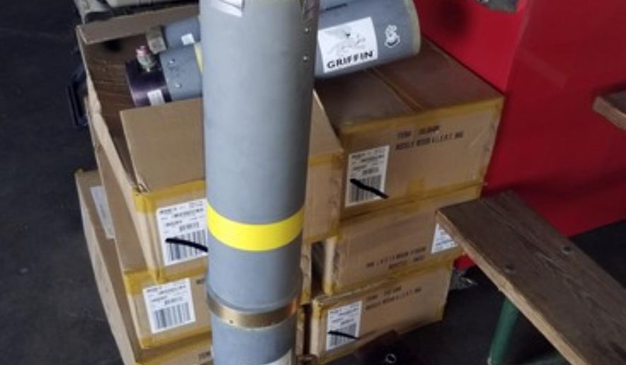 This image released by the Office of the State Fire Marshal's in Maryland, shows a rocket launcher tube that was seized at baggage area, Thursday, Aug. 1, 2019, at Baltimore/Washington International Thurgood Marshall Airport near Baltimore. The launch tube was brought back on a military flight by an Air Force sergeant as a souvenir from their service abroad. This is the second recovered rocket launcher military souvenir seized at the airport this week. (Office of the State Fire Marshal's via AP)