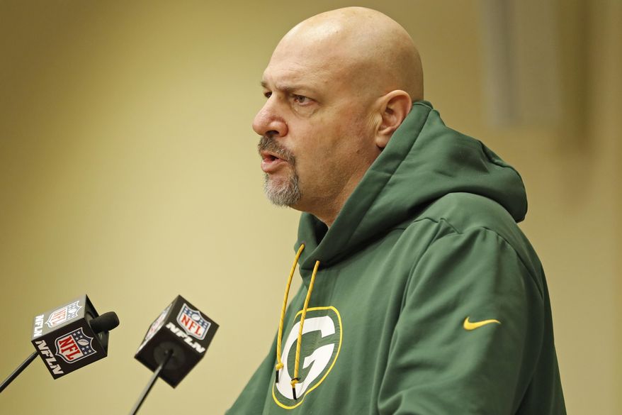 FILE - In this Feb. 18, 2019, file photo, Green Bay Packers' defensive coordinator Mike Pettine addresses the media during a press conference in Green Bay, Wis. The Packers used major assets this offseason to upgrade their defense and Pettine and others are seeing the difference.(AP Photo/Matt Ludtke, File)