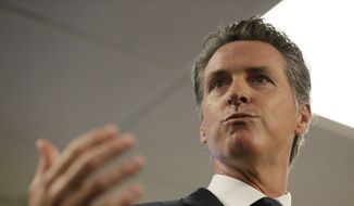 California Gov. Gavin Newsom during a news conference after touring the 911 call center at the San Francisco Department of Emergency Management Friday, Aug. 2, 2019, in San Francisco. (AP Photo/Eric Risberg) ** FILE **