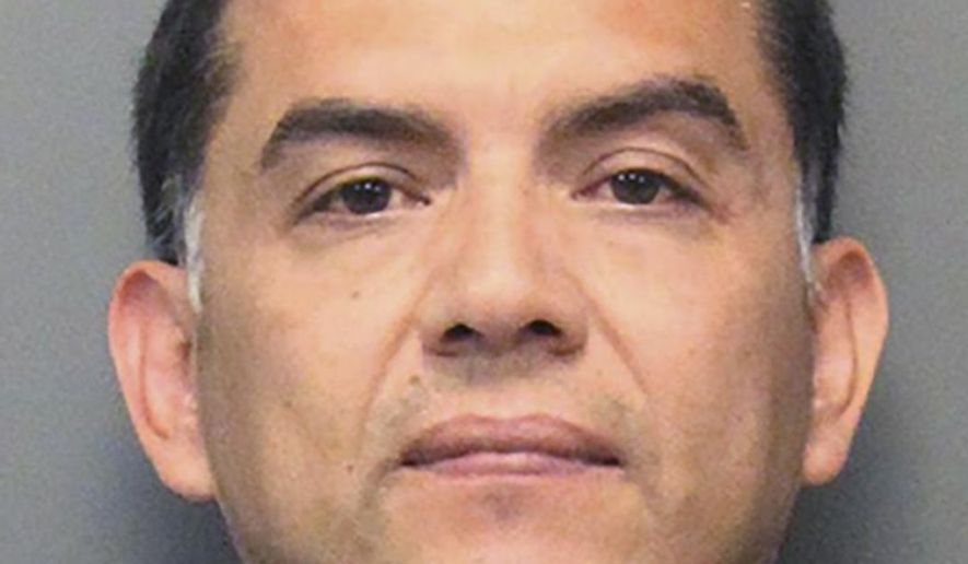 This Thursday, Aug. 1, 2019 booking photo released by the Gilroy, Calif., Police Department shows Jose Pinon. Police say Pinon, 40, was arrested after he made threats that apparently referenced the deadly shooting at the Gilroy Garlic Festival in Gilroy, Calif. Authorities say Friday that Jose Pinon had posted "my goal is to kill 500, not three" on Facebook, a reference they believe is to the garlic festival shooting that killed three people and wounded 13 others. (Gilroy Police Department via AP)