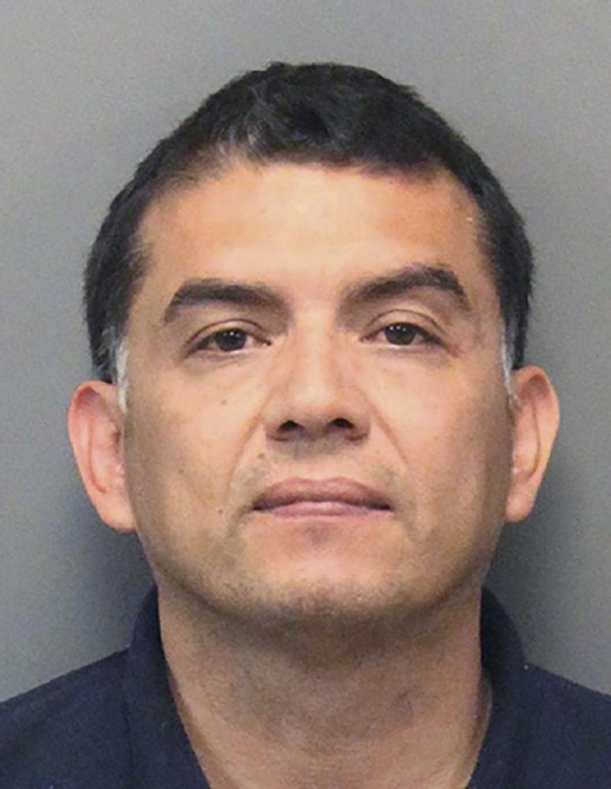 This Thursday, Aug. 1, 2019 booking photo released by the Gilroy, Calif., Police Department shows Jose Pinon. Police say Pinon, 40, was arrested after he made threats that apparently referenced the deadly shooting at the Gilroy Garlic Festival in Gilroy, Calif. Authorities say Friday that Jose Pinon had posted "my goal is to kill 500, not three" on Facebook, a reference they believe is to the garlic festival shooting that killed three people and wounded 13 others. (Gilroy Police Department via AP)