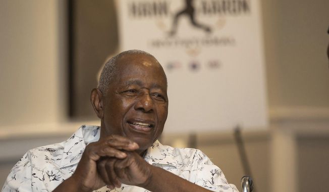 Hank Aaron answers questions from the crowd during the Hank Aaron Invitational at SunTrust Park in Atlanta, Aug. 2, 2019. (Steve Schaefer/Atlanta Journal-Constitution via AP)