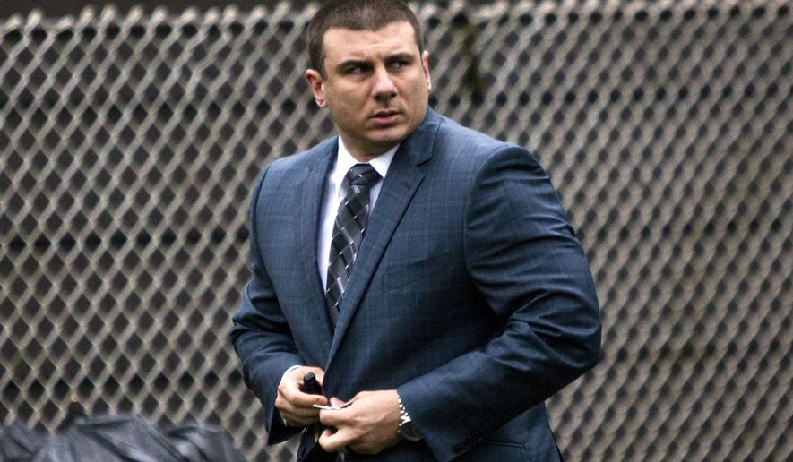 FILE - In this May 13, 2019, file photo, New York City Police Officer Daniel Pantaleo leaves his house in the Staten Island borough of New York. An administrative judge on Friday, Aug. 2,2019,  has recommended firing Pantaleo, a New York City police officer accused of using a chokehold in the 2014 death of Eric Garner. (AP Photo/Eduardo Munoz Alvarez, File)