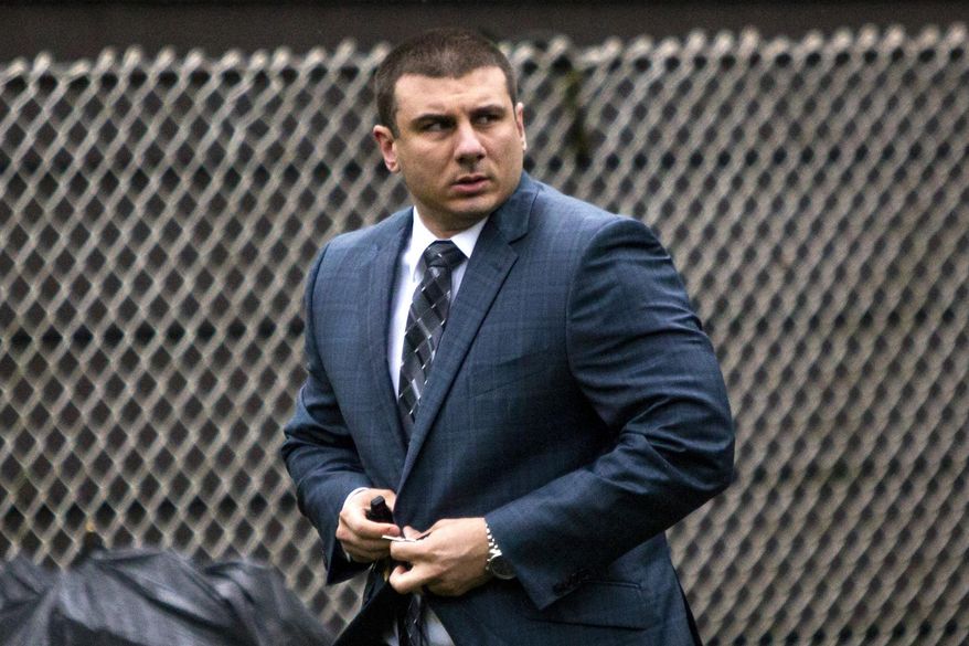 FILE - In this May 13, 2019, file photo, New York City Police Officer Daniel Pantaleo leaves his house in the Staten Island borough of New York. An administrative judge on Friday, Aug. 2,2019,  has recommended firing Pantaleo, a New York City police officer accused of using a chokehold in the 2014 death of Eric Garner. (AP Photo/Eduardo Munoz Alvarez, File)