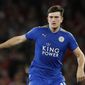 FILE  - In this Friday, Aug. 11, 2017 file photo, Leicester City&#x27;s Harry Maguire looks to pass the ball during their English Premier League soccer match between Arsenal and Leicester City at the Emirates stadium in London. A person with knowledge of the deal says Manchester United is set to break the world transfer record for a defender after agreeing to pay 80 million pounds ($97 million) to sign Harry Maguire from Leicester. The person spoke on condition of anonymity because the transfer is yet to be finalized.  (AP Photo/Alastair Grant, File)