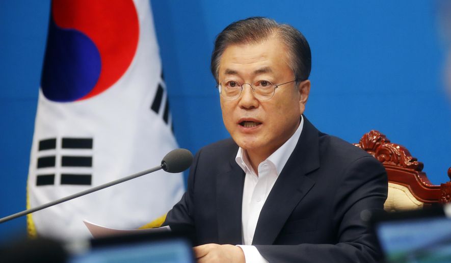 South Korean President Moon Jae-in speaks during an emergency cabinet meeting at the presidential Blue House in Seoul, South Korea, Friday, Aug. 2, 2019. Moon has vowed stern countermeasures against Japan&#x27;s decision to downgrade its trade status, which he described as a deliberate attempt to contain South Korea&#x27;s economic growth and a &amp;quot;selfish&amp;quot; act that would damage global supply chains.(Bae Jae-man/Yonhap via AP)
