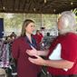 Rep. Elissa Slotkin, D-Mich., talks with a constituent after a veterans event on Friday, Aug. 2, 2019, at the Ingham County Fair in Mason, Mich. Slotkin, who flipped the 8th Congressional District by defeating a Republican incumbent in 2018, has not backed an impeachment inquiry of President Donald Trump. (AP Photo/David Eggert)