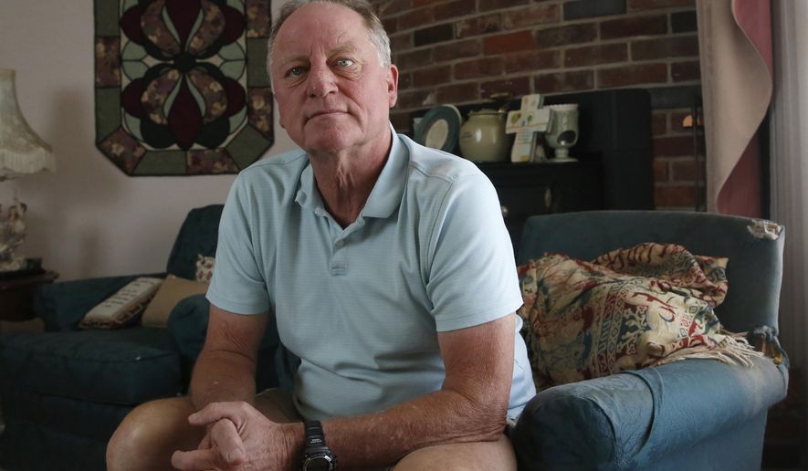 In this Saturday, July 27, 2019 photo, retired nurse Tim Thomas, who assisted in a surgery in the parking lot of Watsonville Community Hospital after the facility lost power following the 1989 Loma Prieta earthquake, poses during his visit to Lodi, Calif. California hospitals are asking lawmakers to scale back earthquake standards because they cost too much and might not be needed. Talk of scaling back the standards upsets Thomas, who was thrown to the floor during the earthquake. "To not make provisions to have the hospitals keep pace with the rest of the infrastructure doesn't make any sense to me" says Thomas. (AP Photo/Rich Pedroncelli)