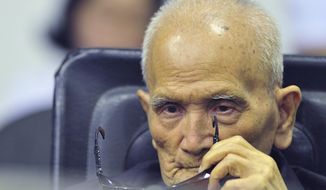 FILE  - In this Nov. 16, 2018 file photo released by the Extraordinary Chambers in the Courts of Cambodia, Nuon Chea, who was the Khmer Rouge&#x27;s chief ideologist and No. 2 leader, sits in a court room before a hearing at the U.N.-backed war crimes tribunal in Phnom Penh, Cambodia.  Chea, the chief ideologue of the communist Khmer Rouge regime that destroyed a generation of Cambodians, died Sunday, Aug. 4, 2019,  the country’s U.N.-assisted genocide tribunal announced. He was 93. (Mark Peters/Extraordinary Chambers in the Courts of Cambodia via AP, File)