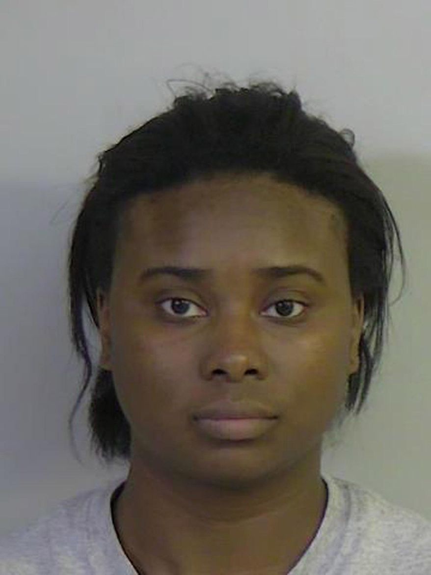 This Aug. 5, 2019, photo shows Angela Nichole Mayo, who is charged in the fatal shooting of a co-worker on the assembly line at a car parts plant near Tuscaloosa, Ala. News outlets report 27-year-old Shanina Smith was killed while working at a Lear Corp. factory that makes seats for Mercedes-Benz. (Tuscaloosa County Sheriff's Office via AP)