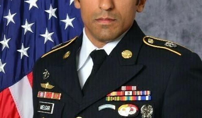 This undated photo provided by the U.S. Army shows U.S. Army Staff Sgt. Logan Melgar Green Beret.  A military court hearing is set to begin in Virginia for a U.S. Marine and a Navy SEAL who are charged in the 2017 hazing death of a U.S. Green Beret in Africa. Monday&#x27;s, April 5, 2019, preliminary hearing at Naval Station Norfolk will review the cases against Navy SEAL Tony DeDolph and Marine Mario Madera-Rodriguez. DeDolph and Madera-Rodriguez are among four U.S. servicemen charged in the strangulation death of Army Staff Sgt. Logan Melgar in Mali. (U.S. Army via AP)
