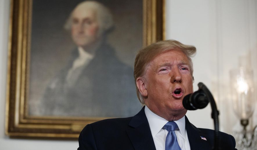 President Donald Trump speaks about the mass shootings in El Paso, Texas and Dayton, Ohio, in the Diplomatic Reception Room of the White House, Monday, Aug. 5, 2019, in Washington. (AP Photo/Evan Vucci)