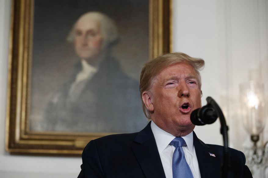 President Donald Trump speaks about the mass shootings in El Paso, Texas and Dayton, Ohio, in the Diplomatic Reception Room of the White House, Monday, Aug. 5, 2019, in Washington. (AP Photo/Evan Vucci)