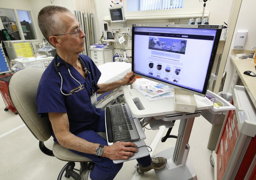 ADVANCE FOR USE MONDAY, MARCH 13, 2017 AND THEREAFTER-Dr. Garen Wintemute, an emergency room physician at the University of California, Davis, Medical Center, shows the website of the Bureau of Alcohol, Tobacco and Firearms, on a computer in the hospital in Sacramento, Calif., on Thursday, March 9, 2017. (AP Photo/Rich Pedroncelli) **FILE**