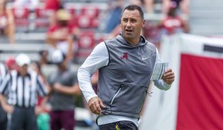 Alabama offensive coordinator Steve Sarkisian works his payers through drills during an NCAA college fall camp fan-day college football scrimmage, Saturday, Aug. 3, 2019, at Bryant-Denny Stadium in Tuscaloosa, Ala. (AP Photo/Vasha Hunt)