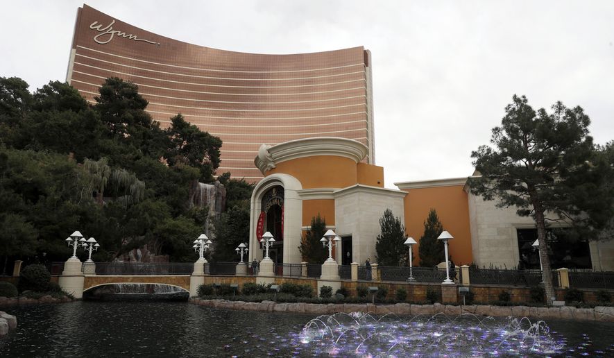 FILE - In this Feb. 19, 2018, file photo, Wynn Las Vegas is pictured in Las Vegas. Wynn Resorts Ltd. on Tuesday, Aug. 6, 2019, reported better than expected quarterly results, with its casinos in both Macau and Las Vegas showing strength. The Las Vegas-based company said it earned net income of $94.6 million, or 88 cents per share. (AP Photo/Isaac Brekken, File)