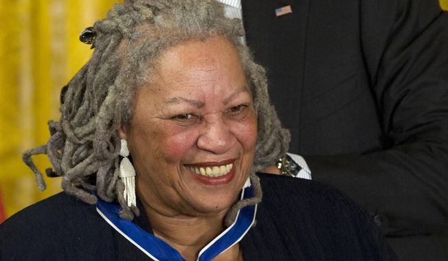 In this May 29, 2012, file photo, author Toni Morrison receives her Medal of Freedom award during a ceremony in the East Room of the White House in Washington. The Nobel Prize-winning author has died. Publisher Alfred A. Knopf says Morrison died Monday, Aug. 5, 2019, at Montefiore Medical Center in New York. She was 88.  (AP Photo/Carolyn Kaster, File)