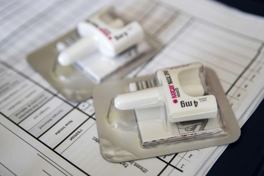 This July 3, 2018, file photo from New York shows a Narcan nasal device that delivers naloxone. (AP Photo/Mary Altaffer) ** FILE **