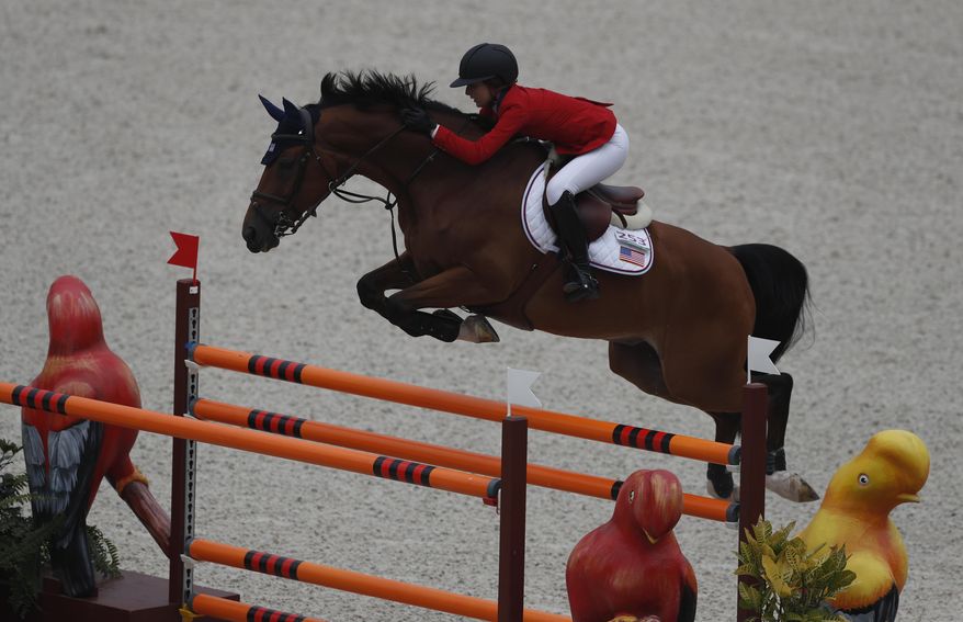 Lucy Deslauriers competes for the U.S. on her horse Hester at the Pan American Games in Lima, Peru, Tuesday, Aug. 6, 2019. A teenage equestrian from Florida (not pictured) perished in a riding accident after her horse tripped and fell on her. (AP Photo/Rebecca Blackwell)