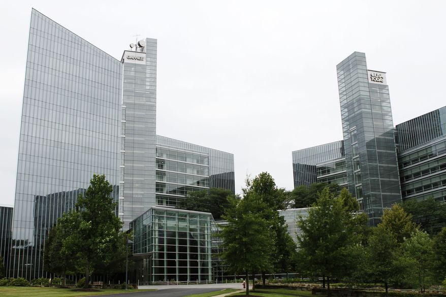 Gannett headquarters and the USA Today building are seen in McLean, Va., on Wednesday, July 14, 2010. (AP Photo/Jacquelyn Martin)