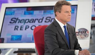 In this Wednesday, Sept. 5, 2018, file photo, Shepard Smith interviews Jon Stewart during a taping of the Shepard Smith Reporting program on the Fox News Channel in New York. (AP Photo/Mary Altaffer)