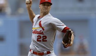 St. Louis Cardinals starting pitcher Jack Flaherty throws to a Los Angeles Dodgers batter during the first inning of a baseball game in Los Angeles, Wednesday, Aug. 7, 2019. (AP Photo/Alex Gallardo)