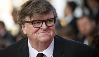  This May 25, 2019, file photo shows Michael Moore at the awards ceremony of the 72nd international film festival, Cannes, southern France. (Photo by Vianney Le Caer/Invision/AP, File)