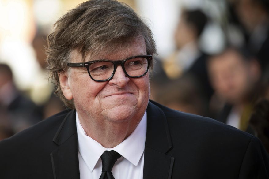 This May 25, 2019, file photo shows Michael Moore at the awards ceremony of the 72nd international film festival, Cannes, southern France. (Photo by Vianney Le Caer/Invision/AP, File)