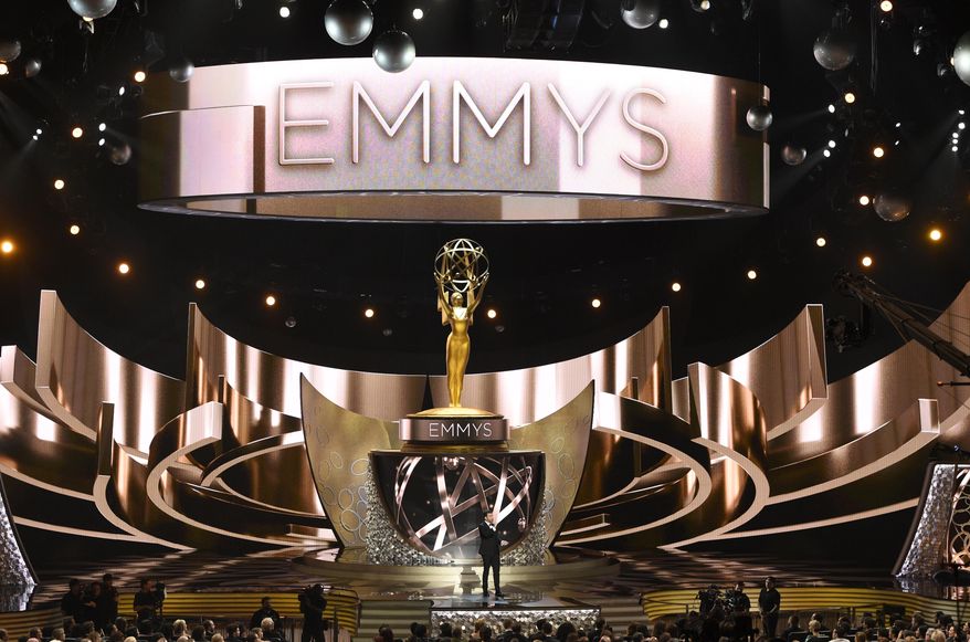 FILE - This Sept. 18, 2016 file photo shows the main stage during the 68th Primetime Emmy Awards in Los Angeles. There will be no host at the ceremony honoring TV’s best next month. Fox Entertainment CEO Charlie Collier said Wednesday, Aug. 7, 2019, that going host-less allows more time to salute departing shows, including “Game of Thrones.” (Photo by Chris Pizzello/Invision/AP, File)