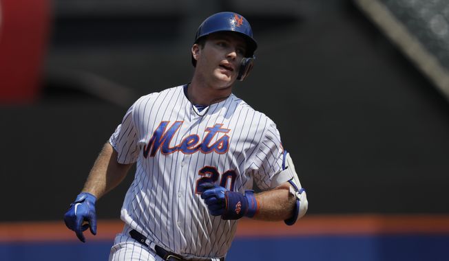 New York Mets&#x27; Pete Alonso rounds the bases with a two-run home run against the Miami Marlins in the first inning of a baseball game, Wednesday, Aug. 7, 2019, in New York. (AP Photo/Mark Lennihan)