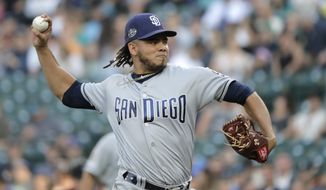 San Diego Padres starting pitcher Dinelson Lamet throws to a Seattle Mariners batter during the first inning of a baseball game Tuesday, Aug. 6, 2019, in Seattle. (AP Photo/Ted S. Warren)