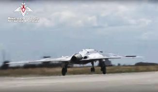 In this video grab made available on Wednesday, Aug. 7, 2019, by Russian Defense Ministry Press Service, Russia&#39;s military drone Okhotnik is seen taking off at an unidentified location in Russia.  (Russian Defense Ministry Press Service via AP)  **FILE**