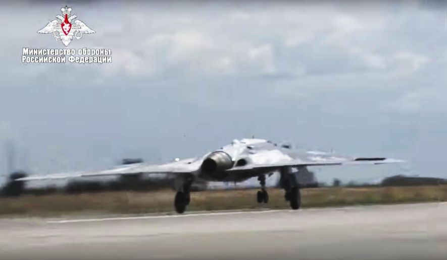 In this video grab made available on Wednesday, Aug. 7, 2019, by Russian Defense Ministry Press Service, Russia&#39;s military drone Okhotnik is seen taking off at an unidentified location in Russia.  (Russian Defense Ministry Press Service via AP)  **FILE**