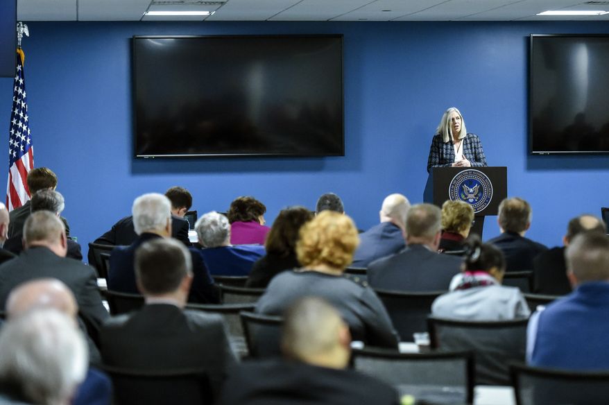 Principal Deputy Director of National Intelligence Susan M. Gordon speaks in Bethesda, Md., Friday, Feb. 16, 2018, to state election officials from all 50 states in the first of two classified briefings being held to raise awareness of foreign meddling in state election systems. The briefings are being hosted by the national intelligence director's office, the FBI and the Department of Homeland Security to discuss ways to mitigate the threat and improve communication between states and the federal government. The state officials were briefed on the threat from foreign intelligence services, cyber threats and foreign influence operations. The classified briefing was held for officials from the National Association of Secretaries of State, the National Association of State Election Directors and the Election Assistance Commission. (Brian Murphy/Office of the Director of National Intelligence via AP)