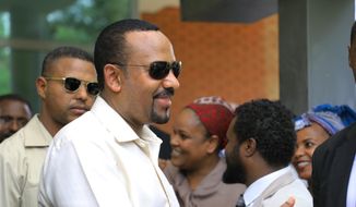 Ethiopia&#39;s Prime Minister Abiy Ahmed arrives in Khartoum, Sudan on Friday, June 7, 2019, to try and mediate between the ruling military and the country&#39;s protest leaders amid an army crackdown that has killed over 100 people this week. (AP Photo) ** FILE **