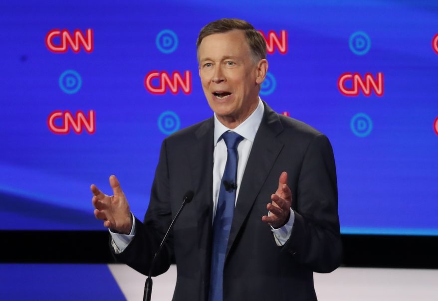 In this July 30, 2019, file photo, former Colorado Gov. John Hickenlooper speaks during the first of two Democratic presidential primary debates in Detroit. Pressure is mounting on former Hickenlooper to trade in his faltering presidential bid for a U.S. Senate run in his home state. (AP Photo/Paul Sancya, File)