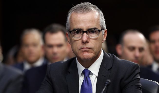 In this June 7, 2017, file photo, then-acting FBI Director Andrew McCabe appears before a Senate Intelligence Committee hearing about the Foreign Intelligence Surveillance Act, on Capitol Hill in Washington. McCabe has sued the FBI and the Justice Department over his firing.  (AP Photo/Alex Brandon, File) **FILE**