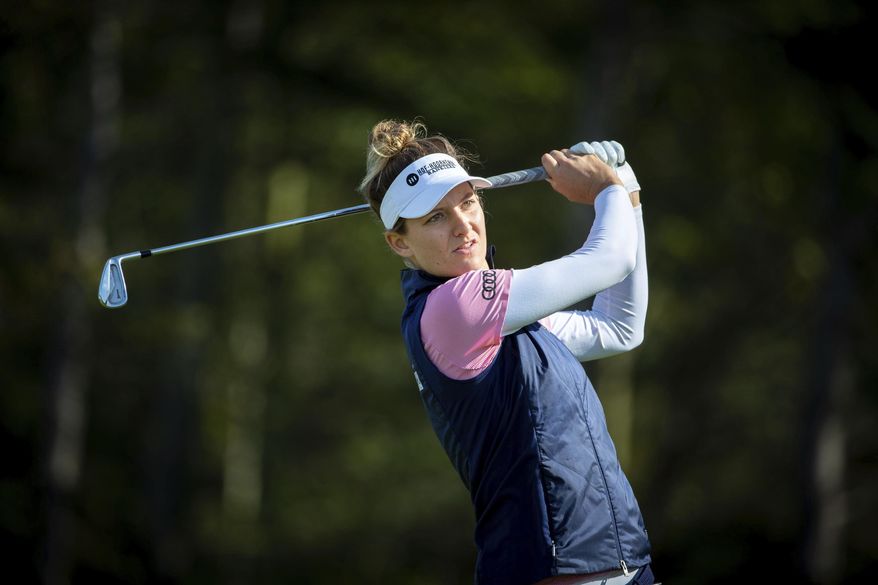 Holland's Anne Van Dam tees off on the 17th, during day one of the Ladies Scottish Open golf tournament at The Renaissance Club, North Berwick, Scotland, Thursday Aug. 8, 2019. (Kenny Smith/PA via AP)