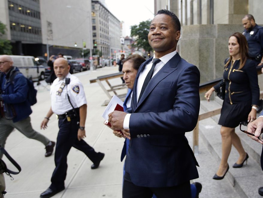 FILE - In this June 13, 2019 file photo, Cuba Gooding Jr. leaves criminal court in New York. A New York City judge has rejected actor Cuba Gooding Jr.'s request to have his groping case thrown out. (AP Photo/Frank Franklin II, File)