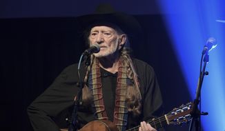In this Feb. 6, 2019, file photo, Willie Nelson performs at the Producers &amp; Engineers Wing 12th Annual GRAMMY Week Celebration at the Village Studio in Los Angeles. (Photo by Richard Shotwell/Invision/AP, File)