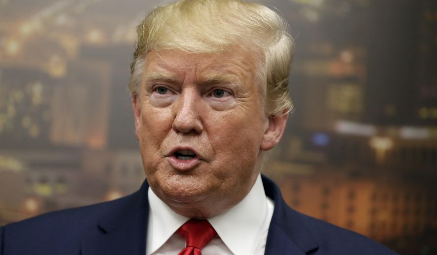 President Donald Trump speaks to the media as he visits the El Paso Regional Communications Center after meeting with people affected by the El Paso mass shooting, Wednesday, Aug. 7, 2019, in El Paso, Texas. (AP Photo/Evan Vucci)