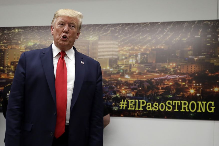 President Donald Trump speaks to the media as he visits the El Paso Regional Communications Center after meeting with people affected by the El Paso mass shooting, Wednesday, Aug. 7, 2019, in El Paso, Texas. (AP Photo/Evan Vucci)
